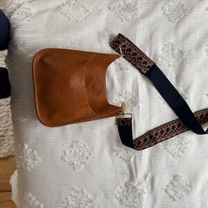 Chic Brown Leather Crossbody with Patterned Strap